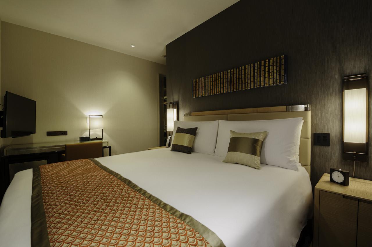 Hotel Oakwood Premier Tokio Exterior foto A bedroom at the hotel