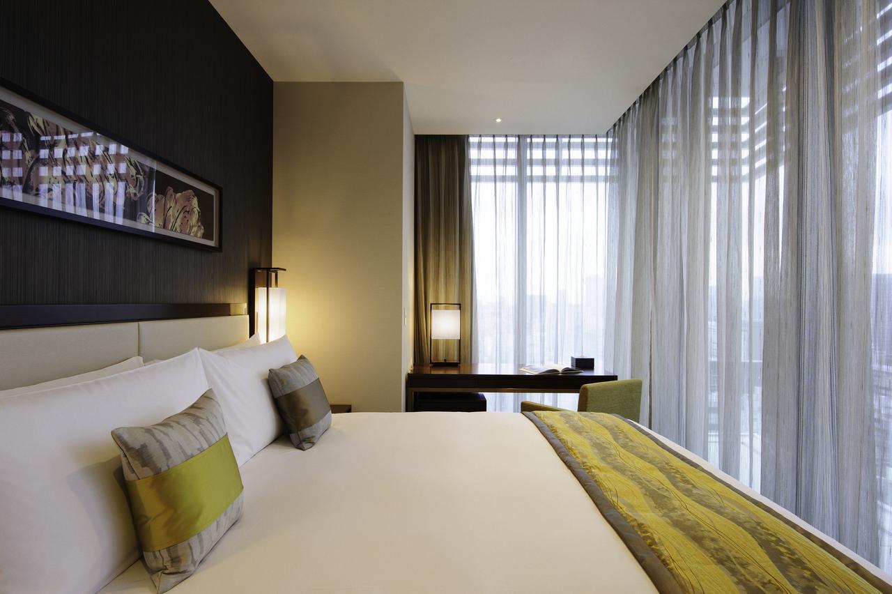 Hotel Oakwood Premier Tokio Exterior foto A bedroom at the hotel